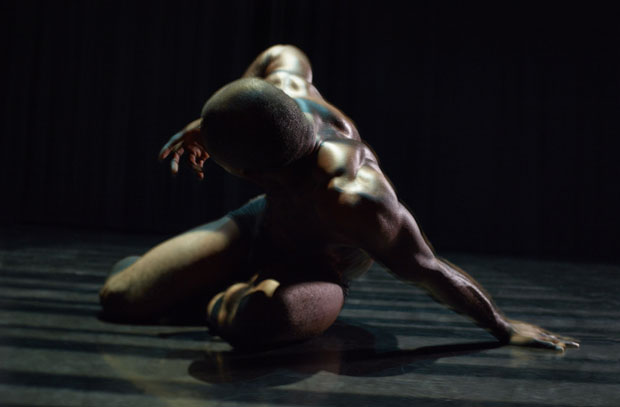 Unknown dancer in unknown piece from the 2013 bill <I>Still / Current</I> (also known as <I>Still Current</I>).<br />© Warren Du Preez & Nick Thornton Jones. (Click image for larger version)