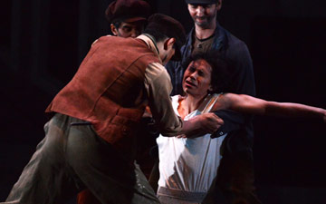 Cesar Morales as the Stranger in Miracle in the Gorbals.© Roy Smiljanic. (Click image for larger version)