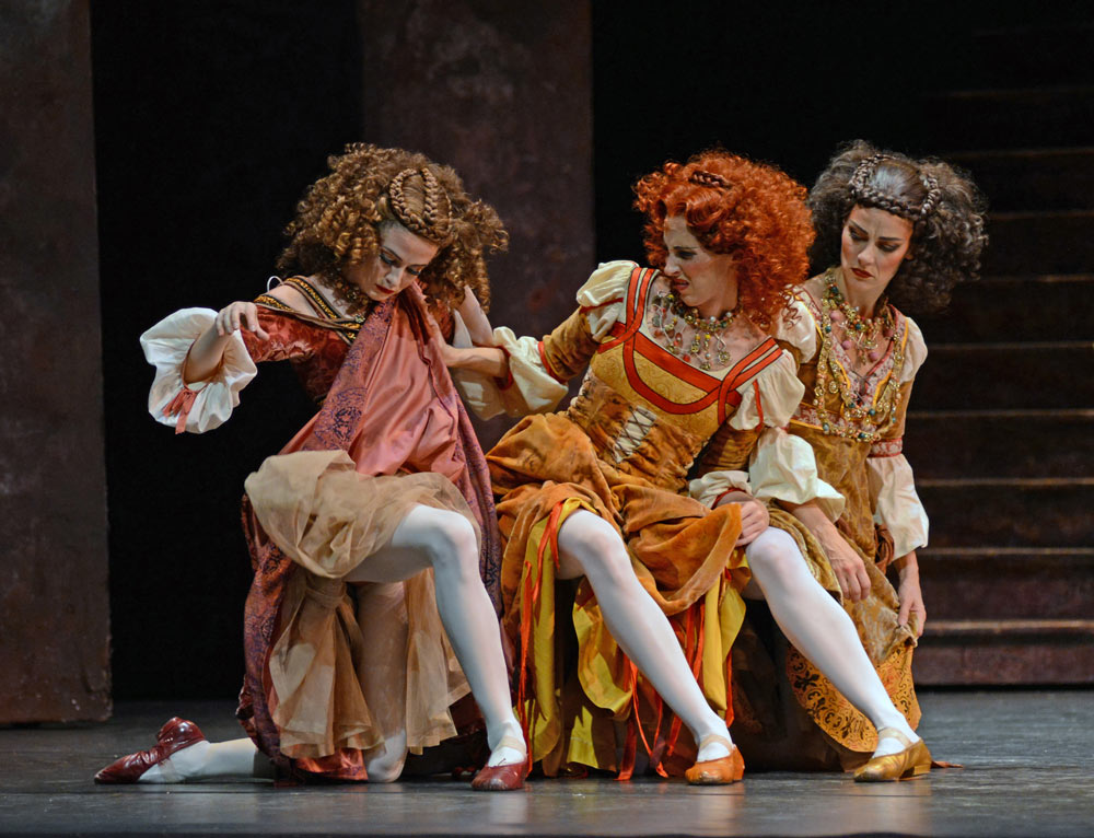 Olivia Cowley, Itziar Mendizabal and Helen Crawford as Harlots in Romeo and Juliet.© Dave Morgan, courtesy the Royal Opera House. (Click image for larger version)