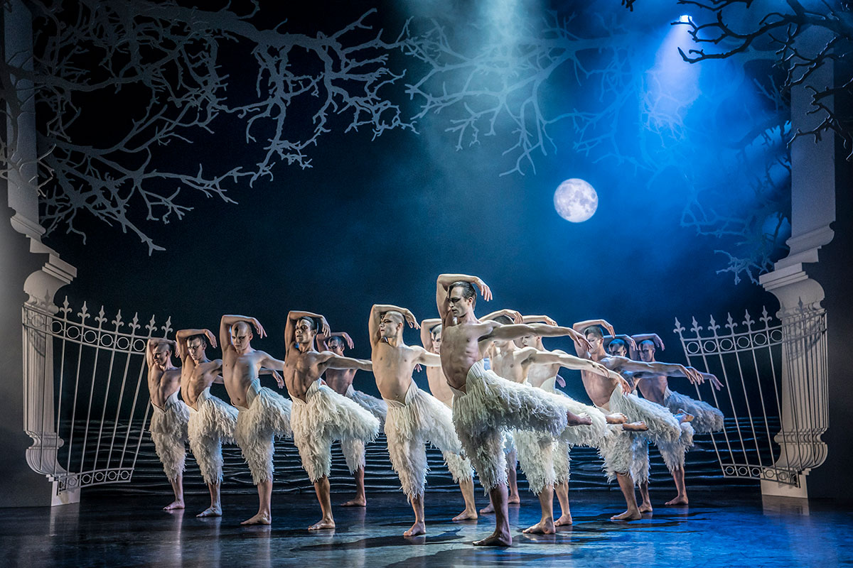 Matthew Ball leading out the New Adventures swans in Swan Lake.© Johan Persson. (Click image for larger version)