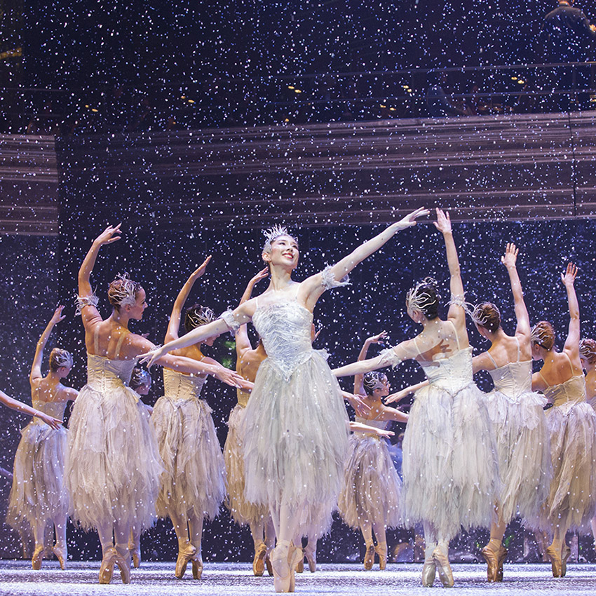 Yijing Zhang as the Snow Fairy and Artists of Birmingham Royal Ballet in the Waltz of the Snowflakes in The Nutcracker.© Andrew Ross. (Click image for larger version)